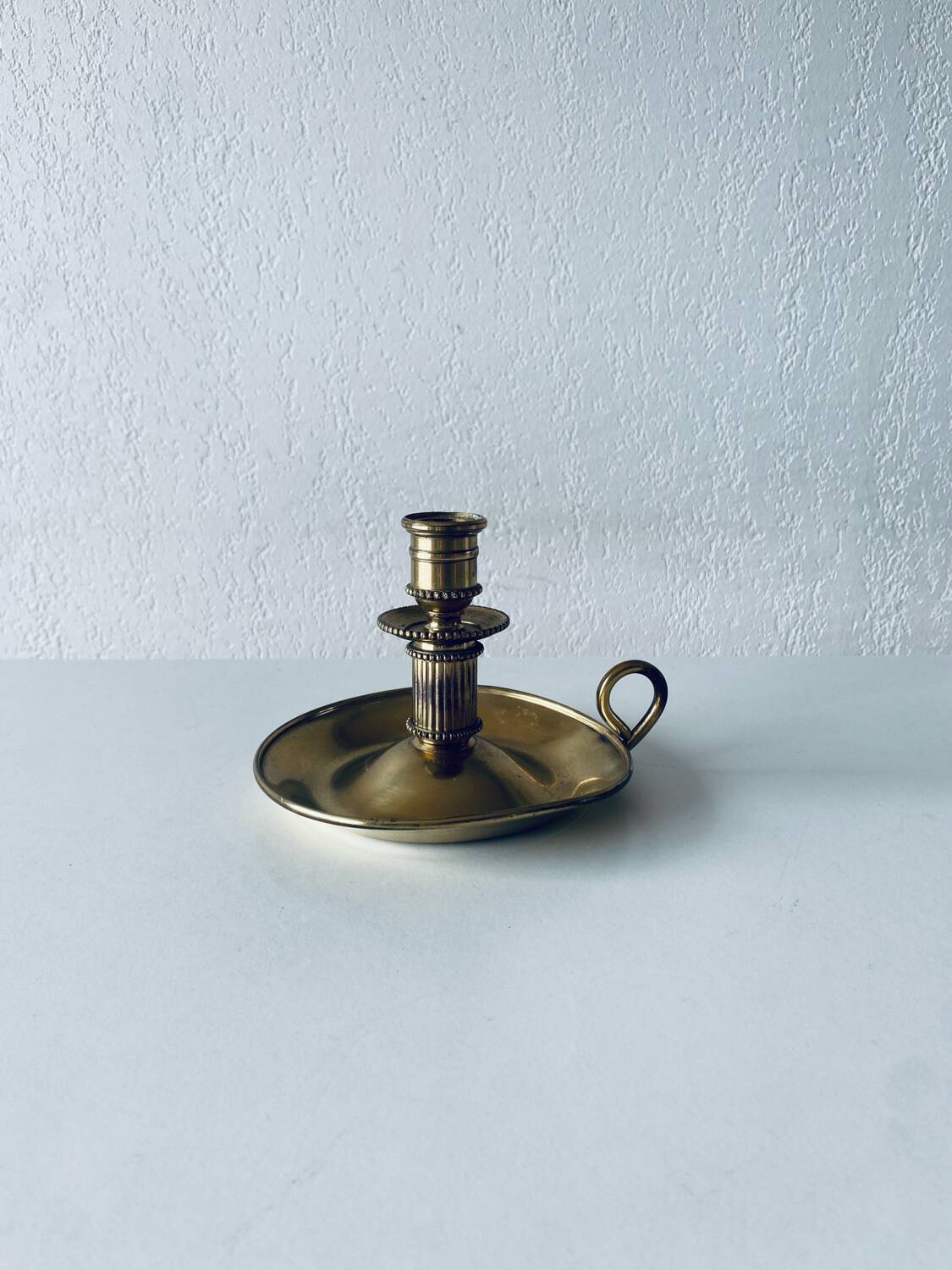 Candle holder with brass handle