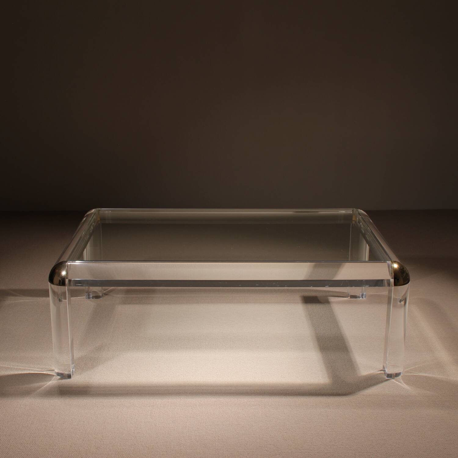 Rectangular Lucite & Brass Coffee Table | Europe 1970s