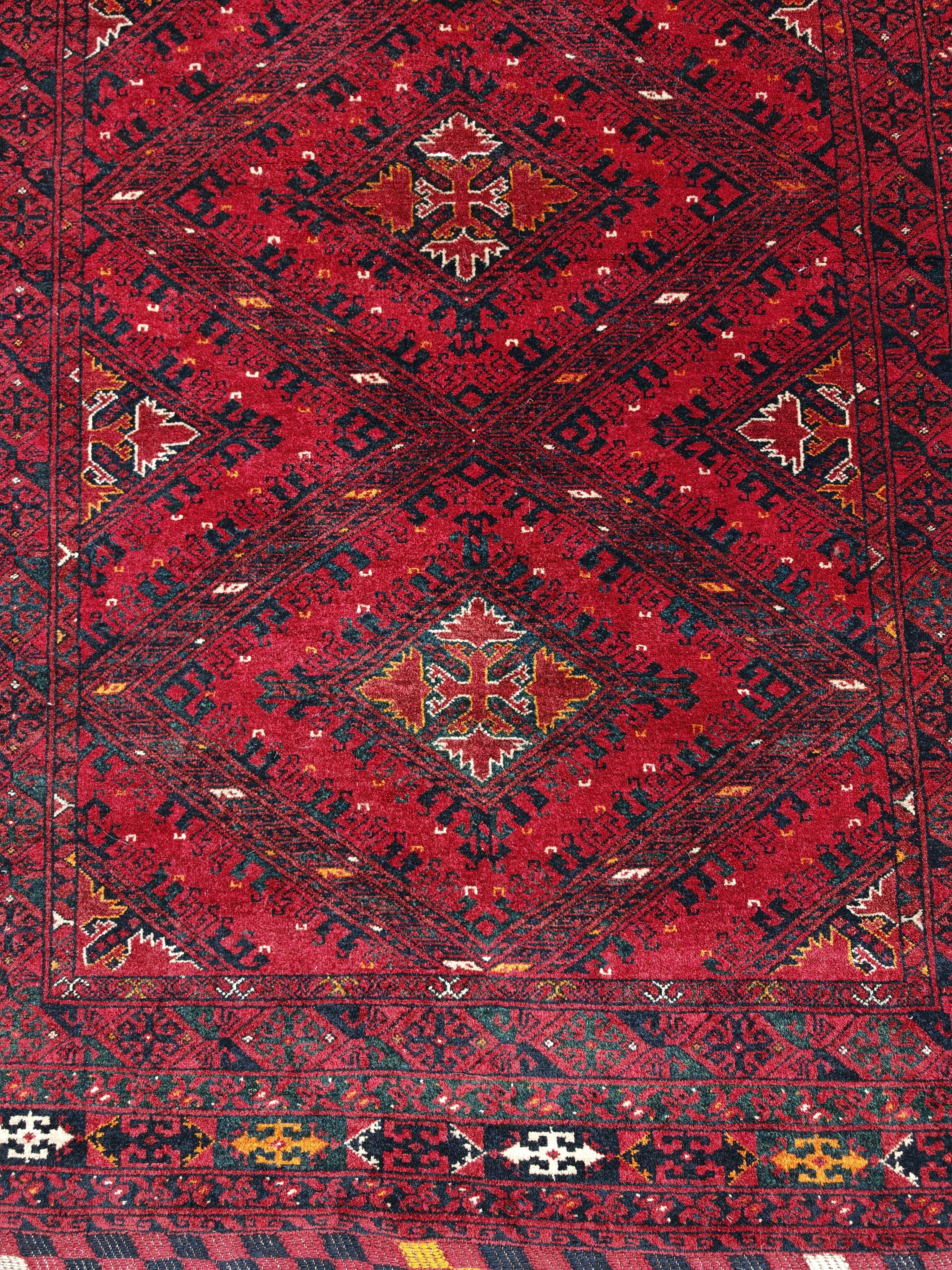 Vintage hand-knotted Kunduz rug, natural dyes, 1940s.