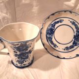 Three cups and two saucers made of Gzhel porcelain.