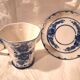 Three cups and two saucers made of Gzhel porcelain.