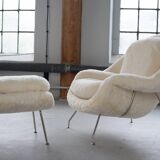 Womb Chair and Ottoman in fluffy white fabric by Eero Saarinen