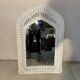 White rattan bedroom set: chest of drawers, mirror, bed, basket