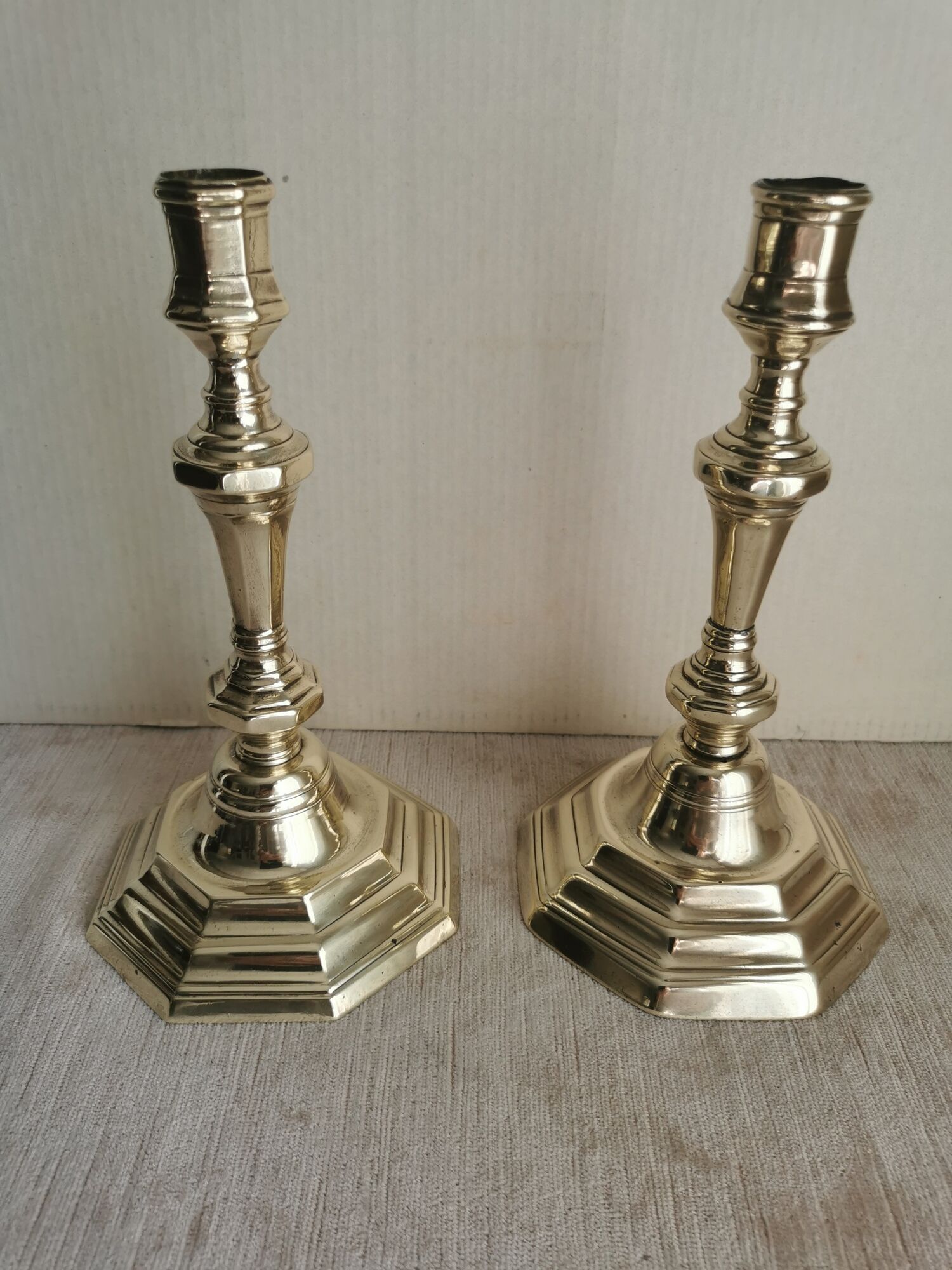 Pair of polished bronze candle holders XVIII th century