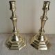 Pair of polished bronze candle holders XVIII th century