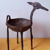 Zoomorphic wrought iron pocket emptier