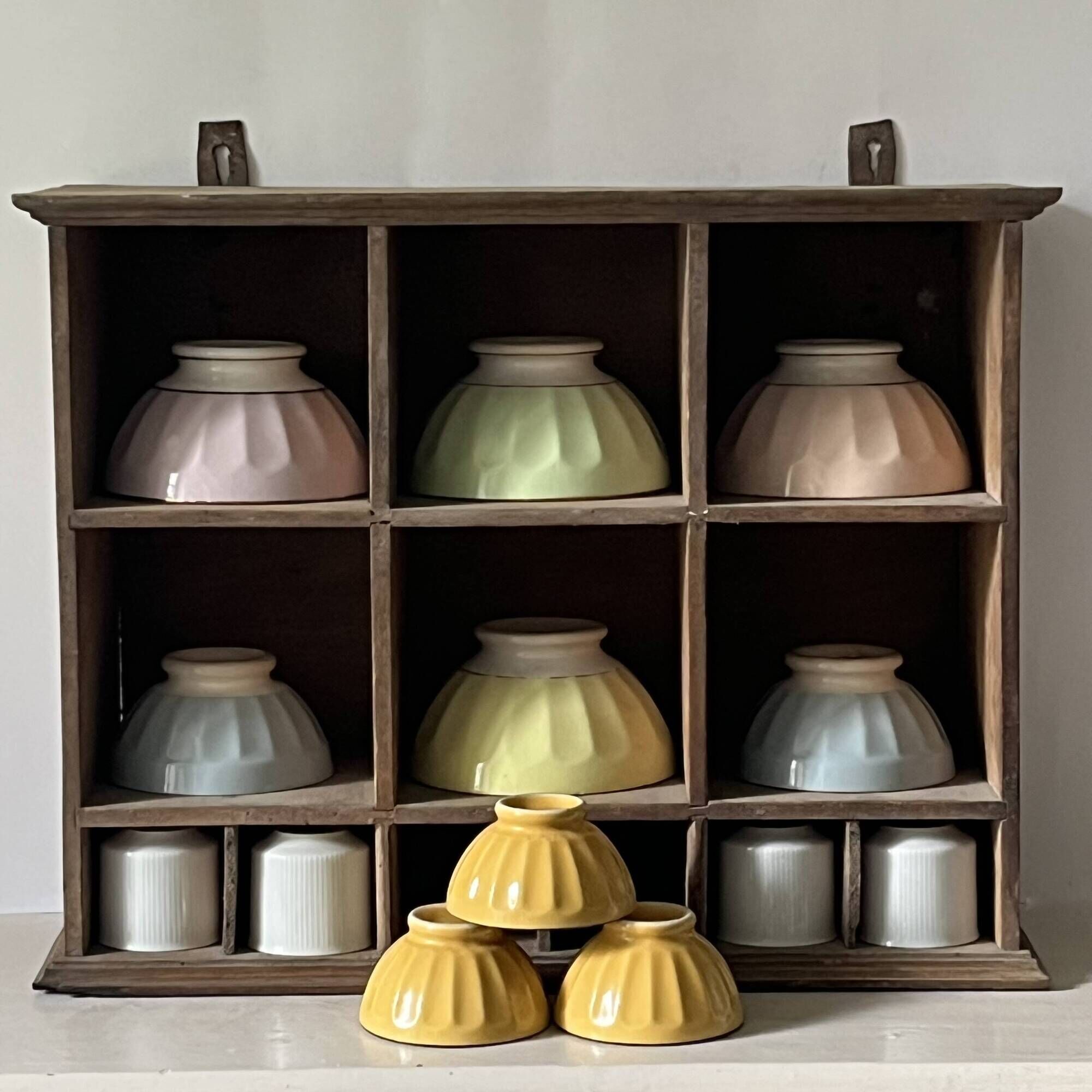 Antique commercial shelving unit with compartments
