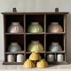 Antique commercial shelving unit with compartments