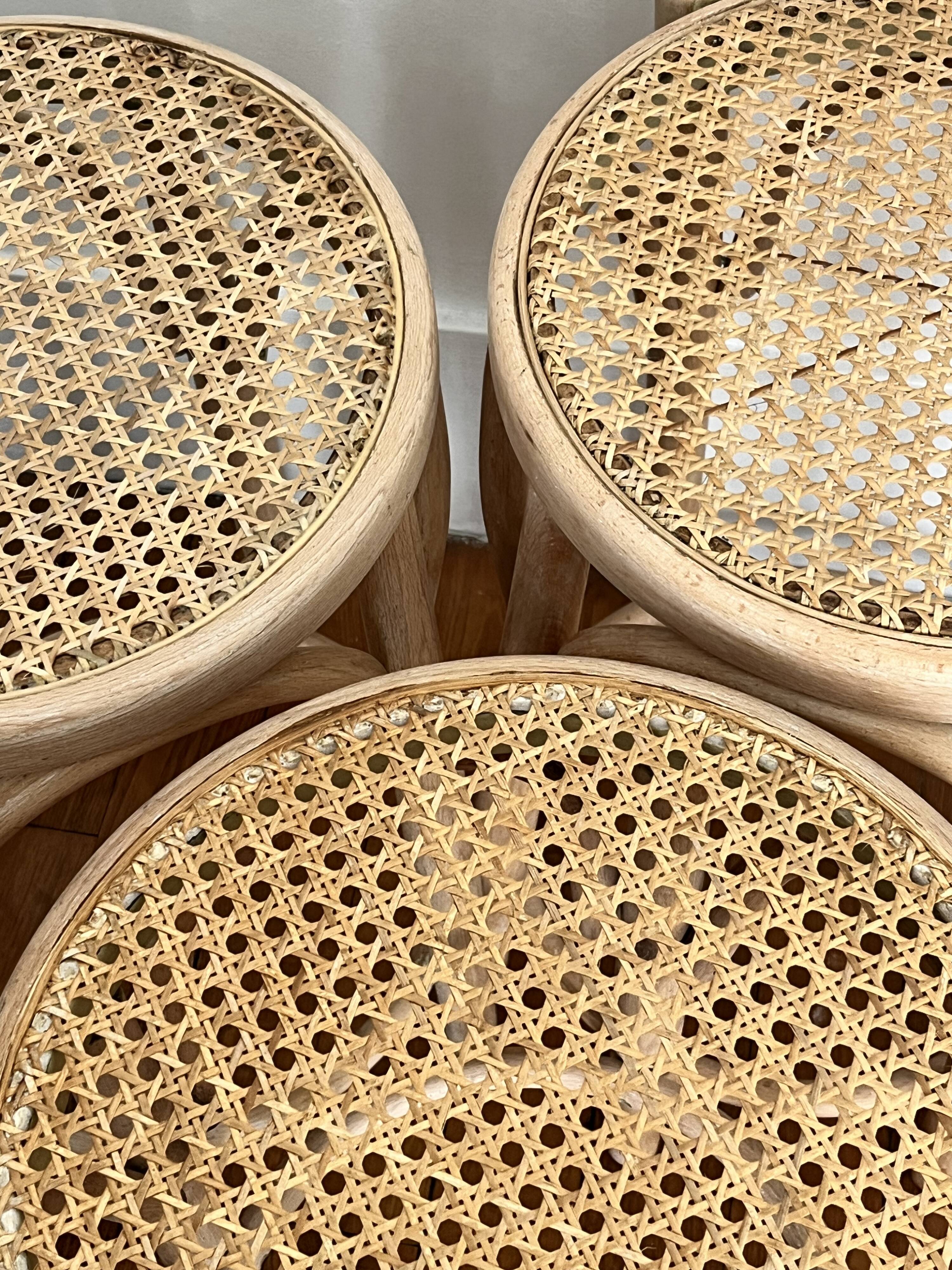Pair of high chairs, curved wood and caning.