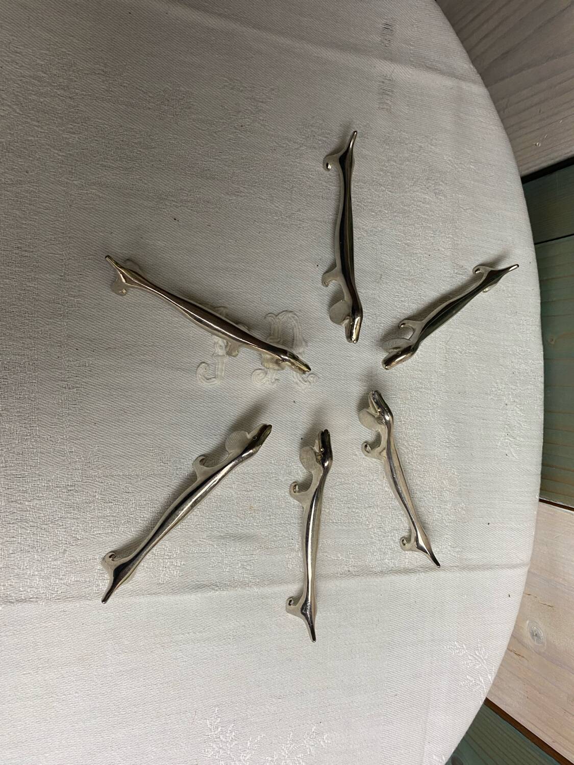 Set of 6 silver metal dachshund knife rests