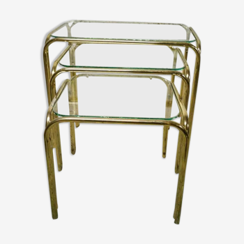 Trio of nesting tables in gold metal