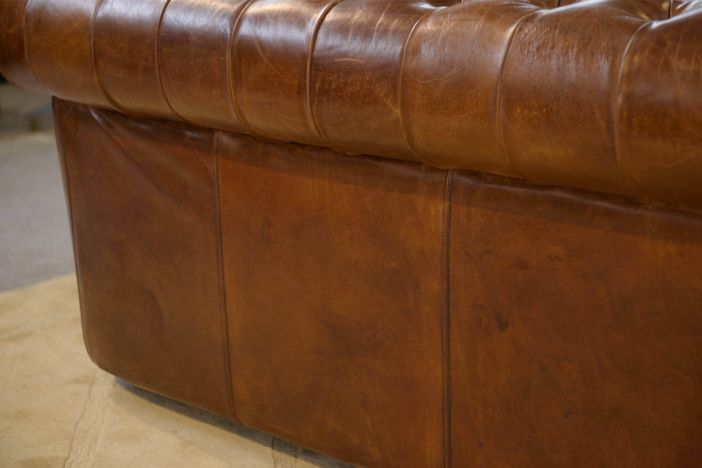 Brown leather Chesterfield sofa