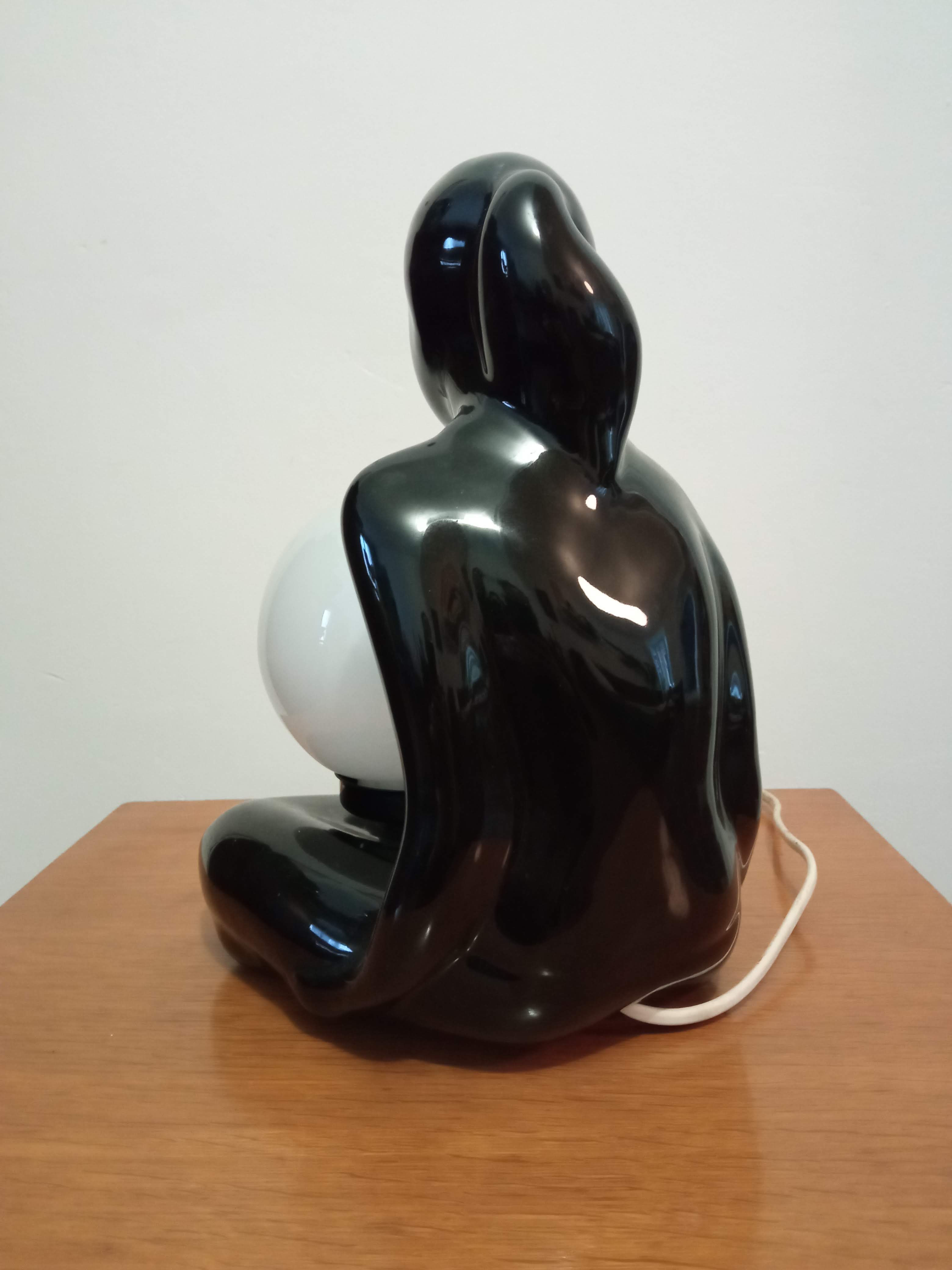 Lamp black ceramic and opaline globe circa 1970