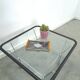 Glazen jaren 70 salontafel met chromen onderstel vintage