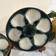 Green and white slip oyster plates