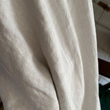 Old white cotton tablecloth.