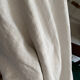 Old white cotton tablecloth.