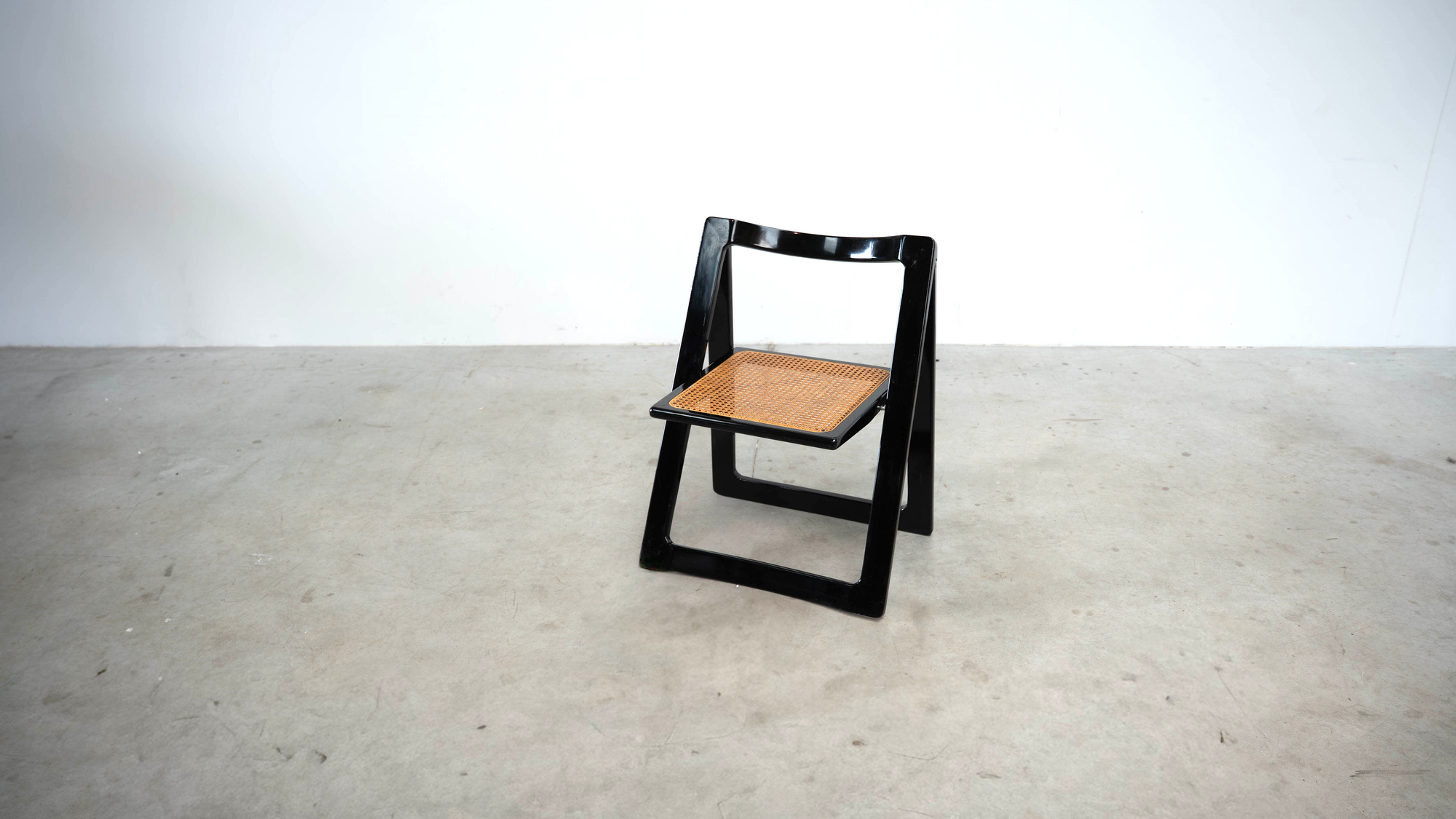 Set of eight folding dining chairs designed by Aldo Jacober for Alberto Bazzani