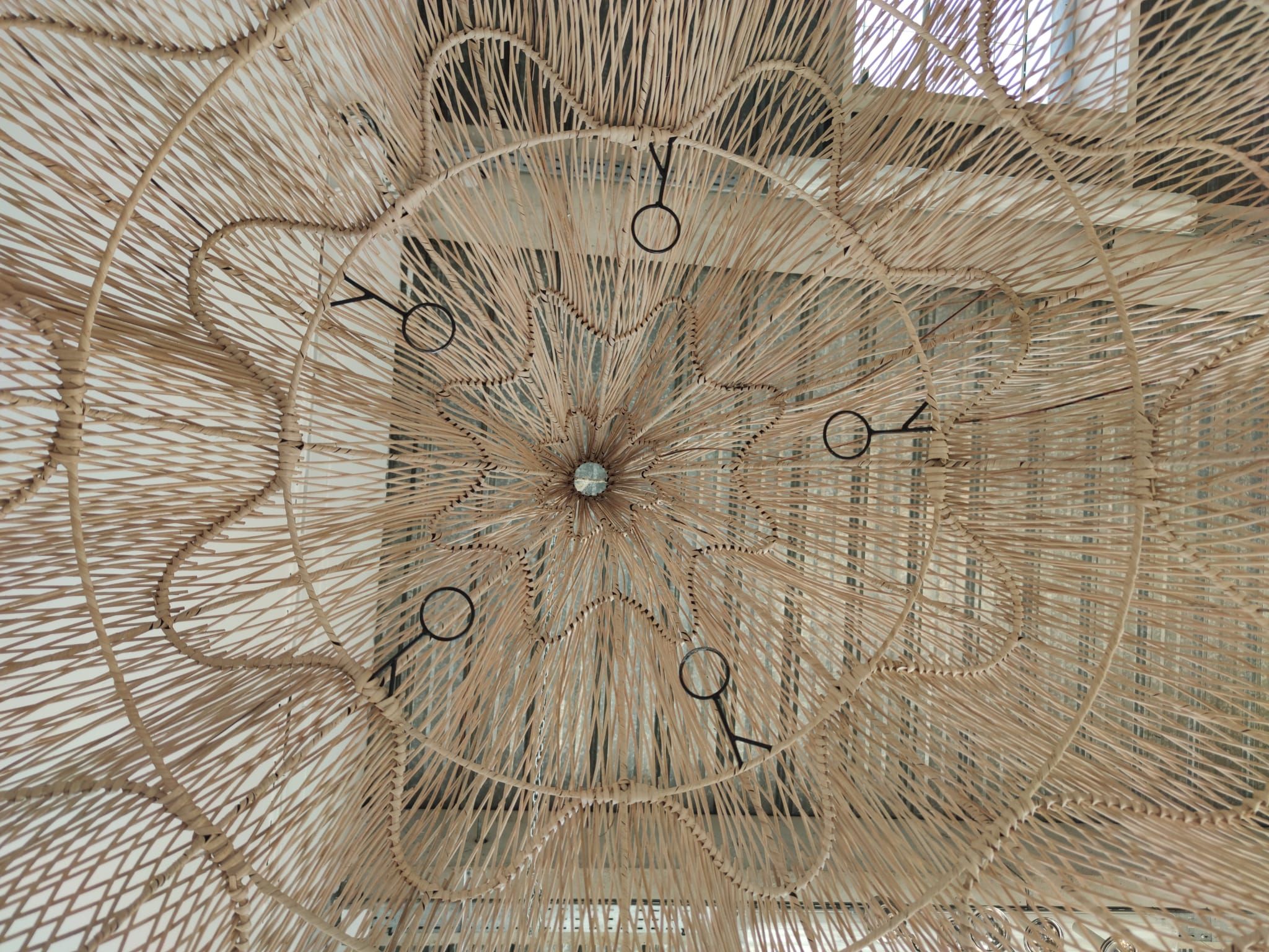 Huge rattan suspension in the shape of a corolla H:1m; D: 1m50