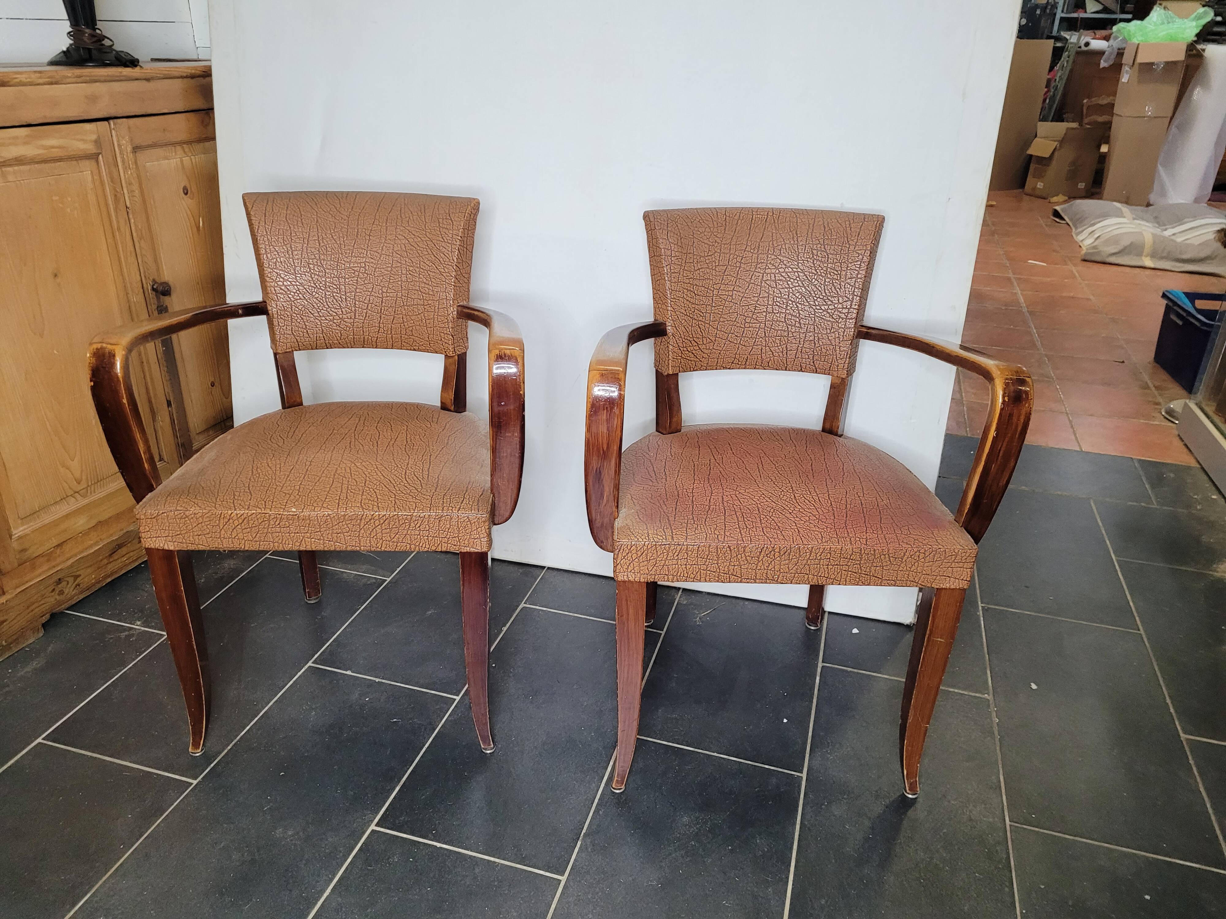 Pair of skai bridge armchairs