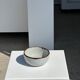 Small white glazed ceramic bowl black edges