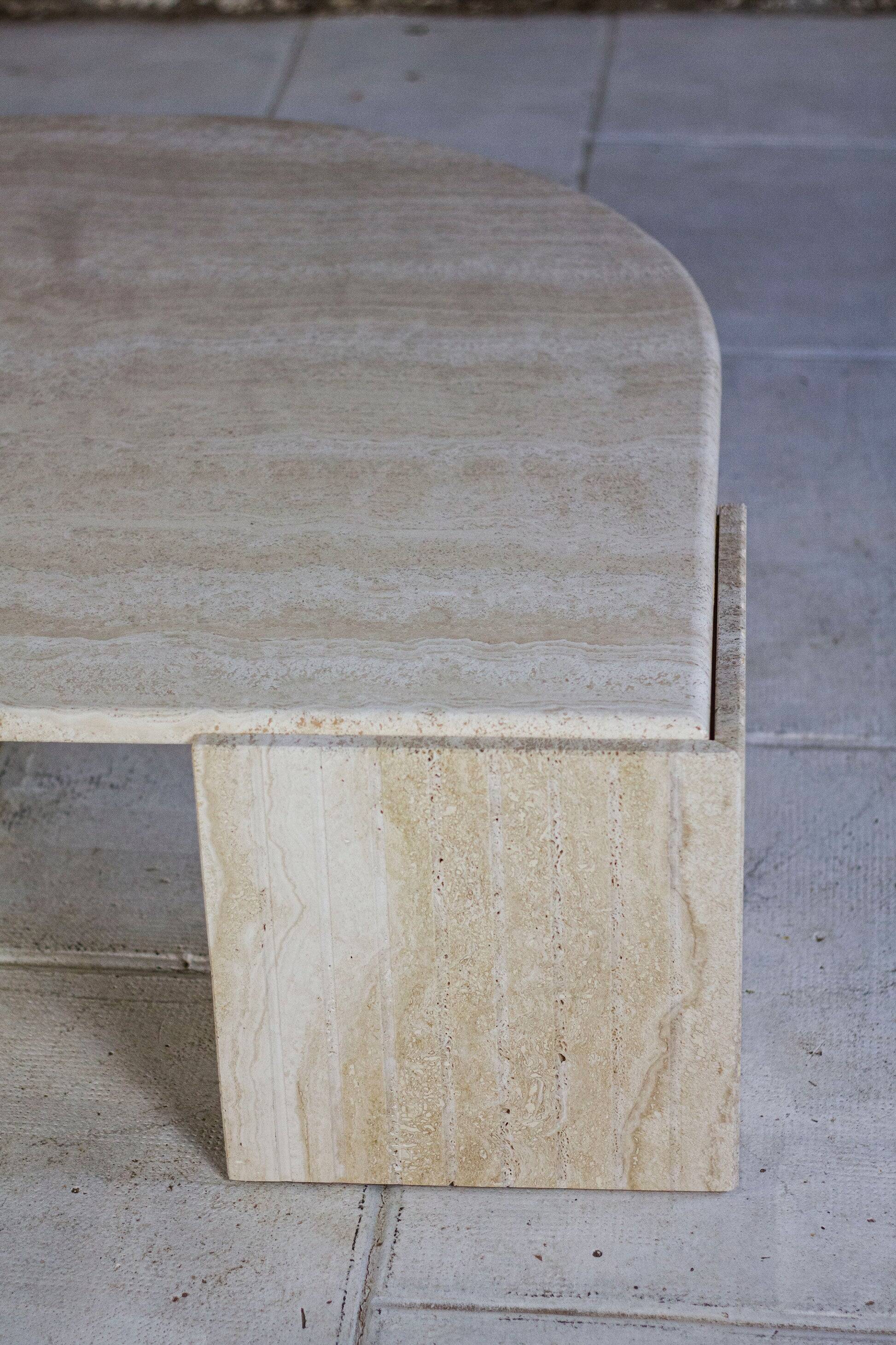 Travertine coffee table "Eye" or "drop" by Roche Bobois, 1980
