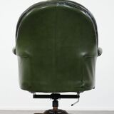 Large green cowhide Chesterfield office chair in English style on wheels