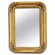 Large Biedermeier gilded mirror in faceted wood, circa 1840.
