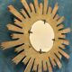 Vintage 1960s witch's eye sun mirror
