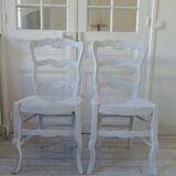 Duo of country-style chairs re-enchanted in pearl gray.