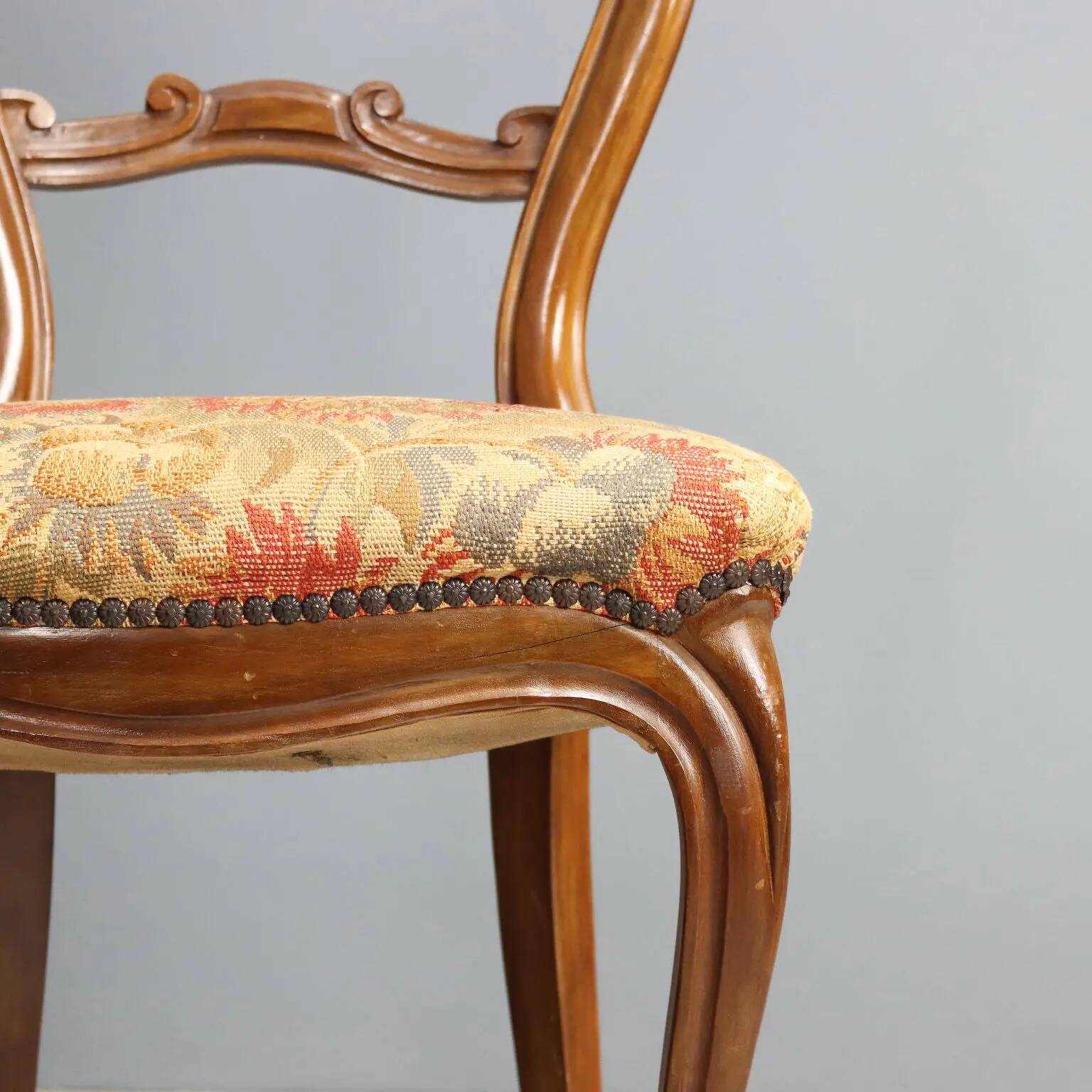 Pair of antique Louis-Philippe chairs in walnut and fabric, Italy, 19th century.