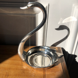 Empty silver swan pocket