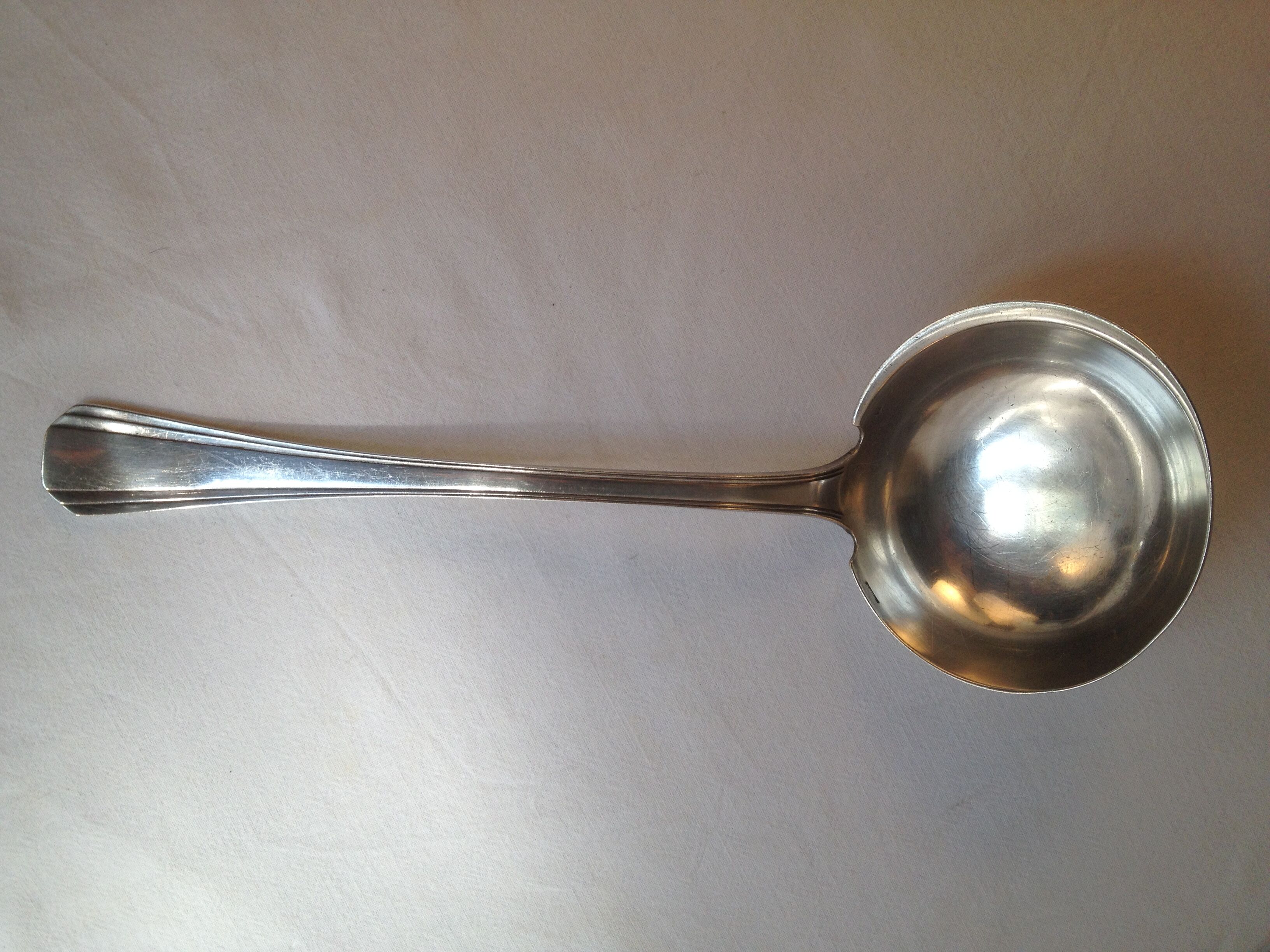 Cream ladle, Christofle, Boreal model in silver metal