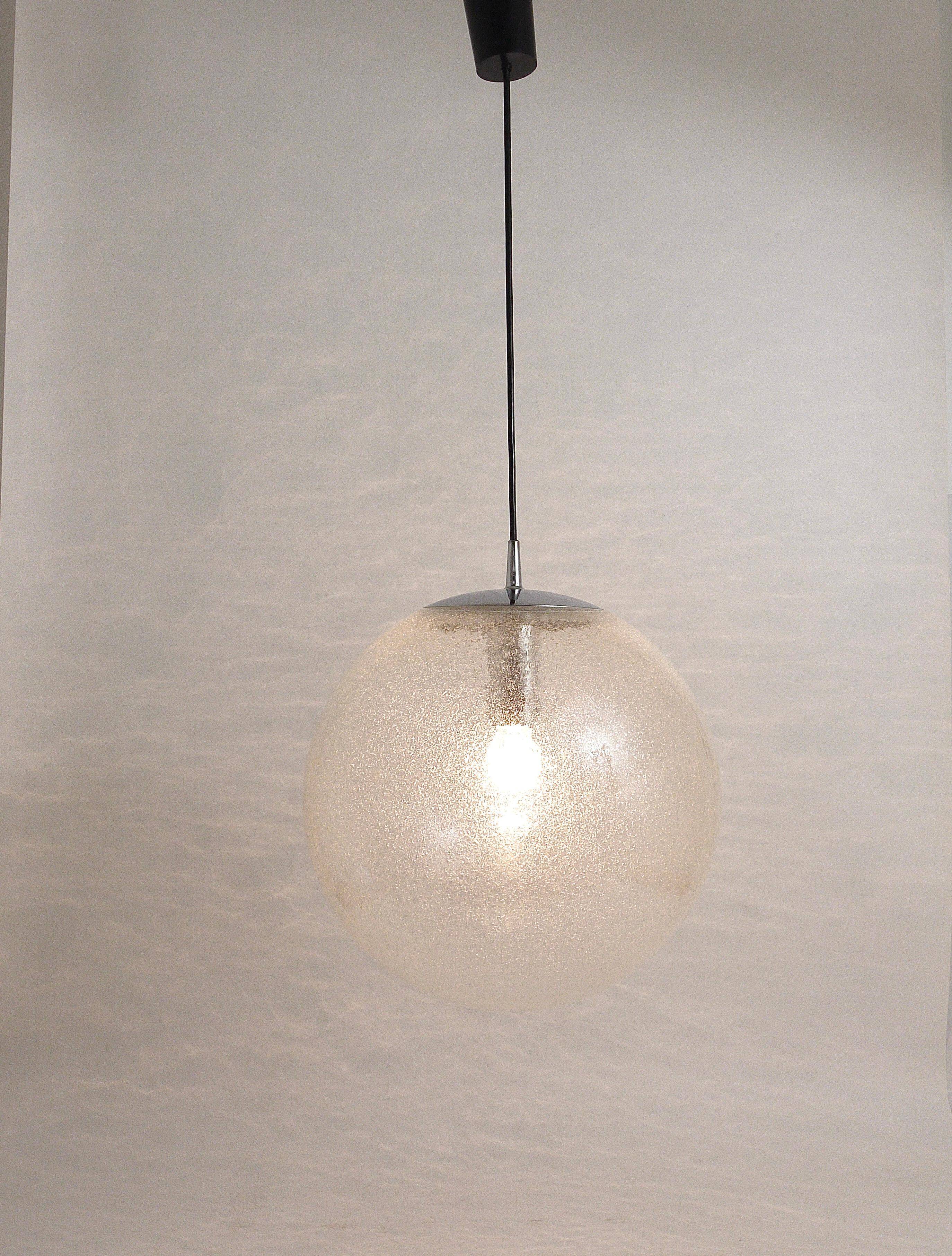 Large glass globe pendant light with bubbles and chrome by Peil & Putzler, Germany, 1970s.