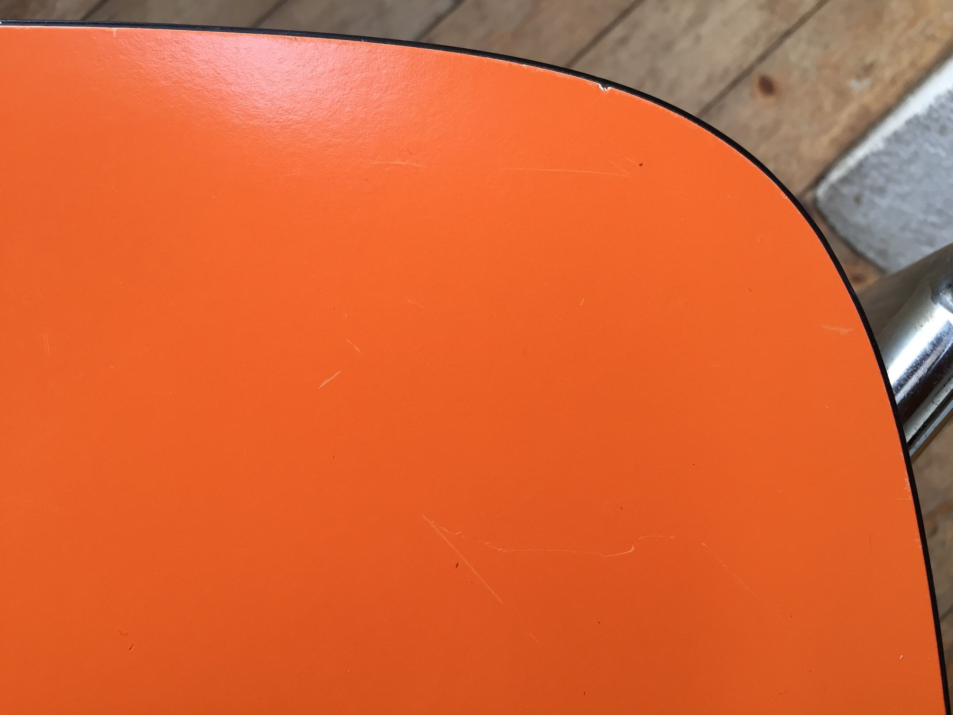 Lot of 4 vintage chairs in orange formica
