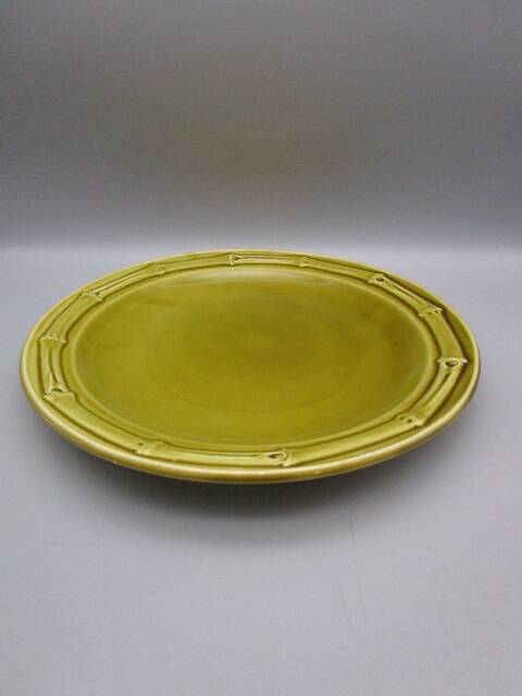 Antique serving plate in Gien earthenware, bamboo decoration.