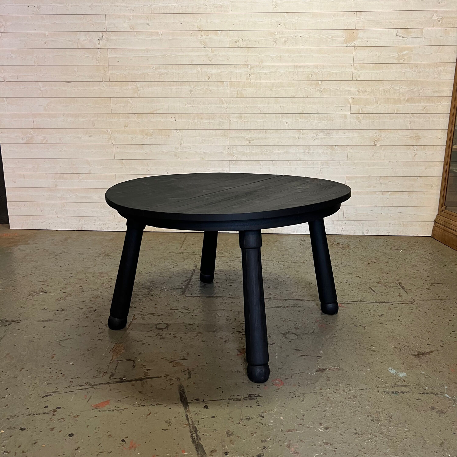 Brutalist round table in burnt wood yakisugi