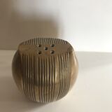 Brass owl wears incense