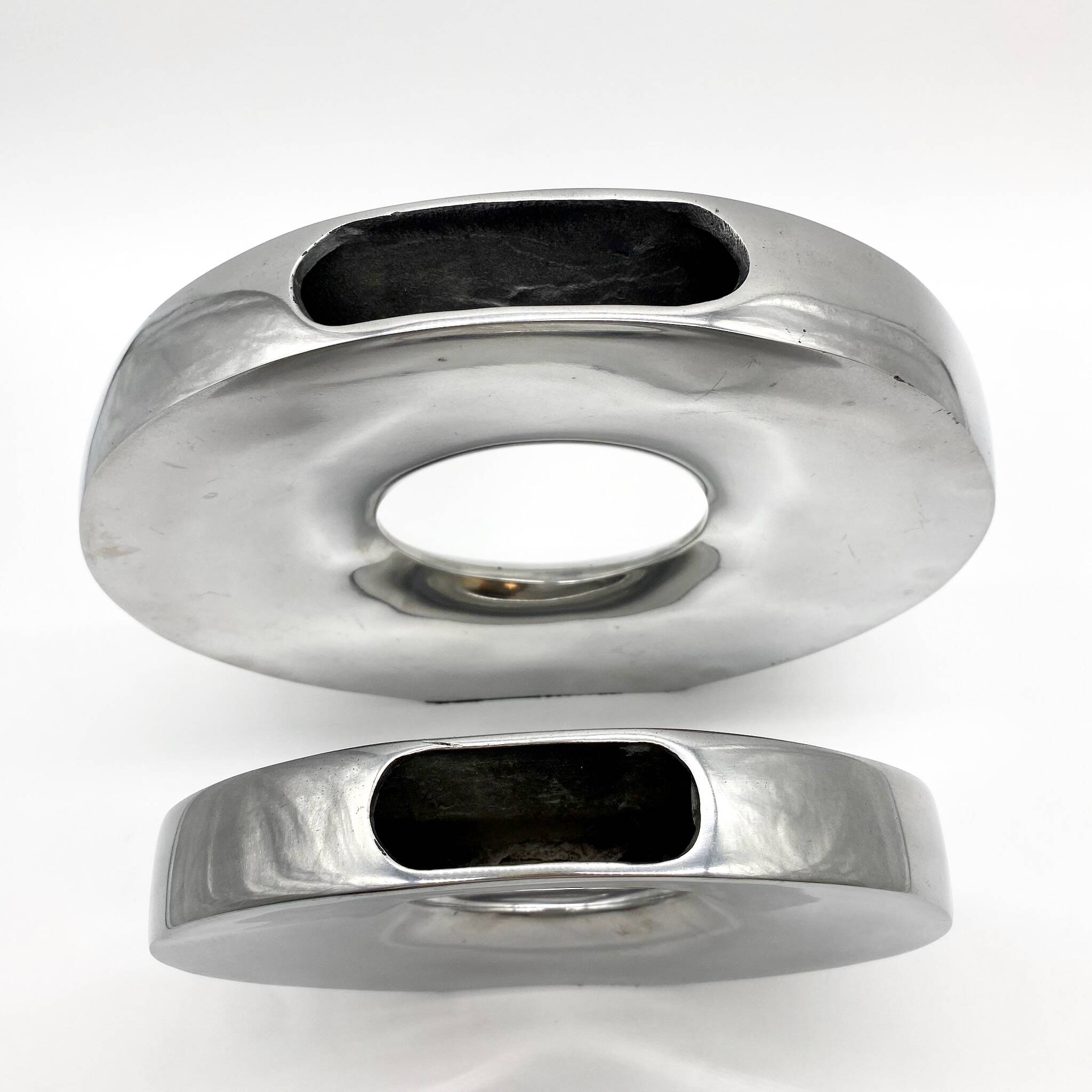 Pair of “donut” vases / cast aluminum – 1970s Italy