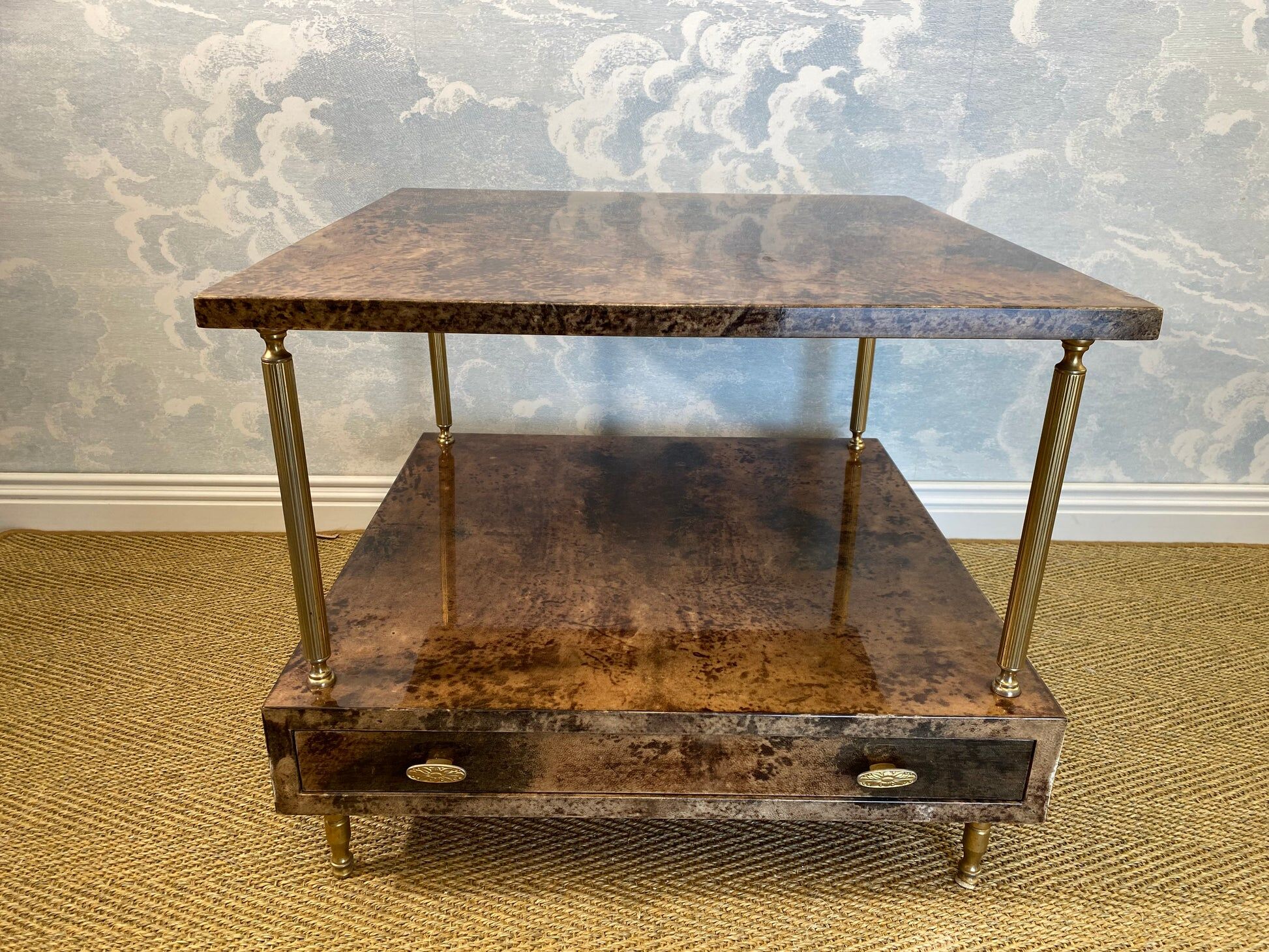 Aldo Tura side table in hazel brown tones with brass legs and bottom drawer
