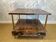 Aldo Tura side table in hazel brown tones with brass legs and bottom drawer
