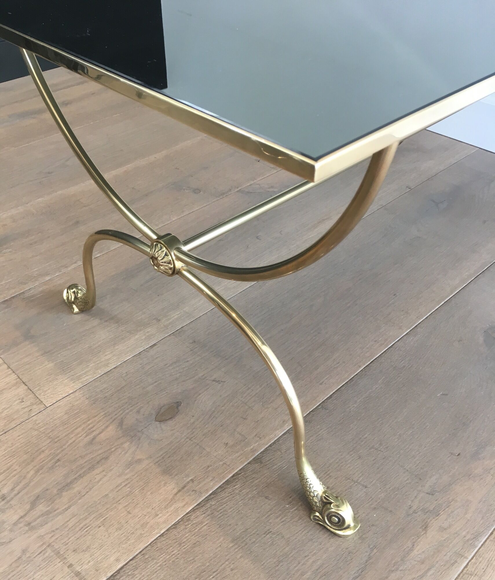 Neoclassical brass style coffee table with dolphin head decoration