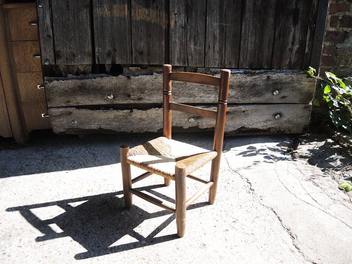 Old children's straw chair