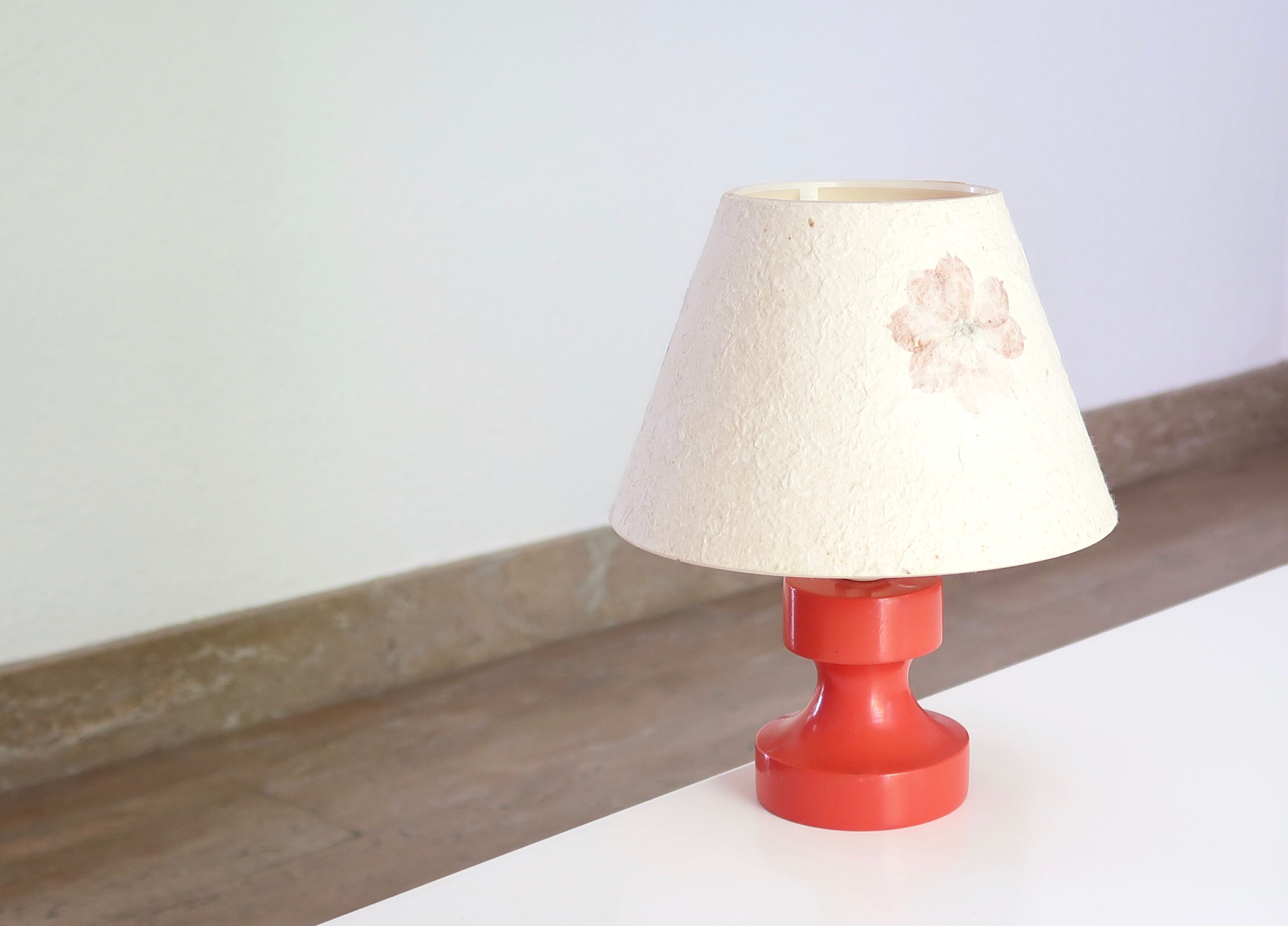 Red wooden lamp with herbarium-style lampshade from the 70s