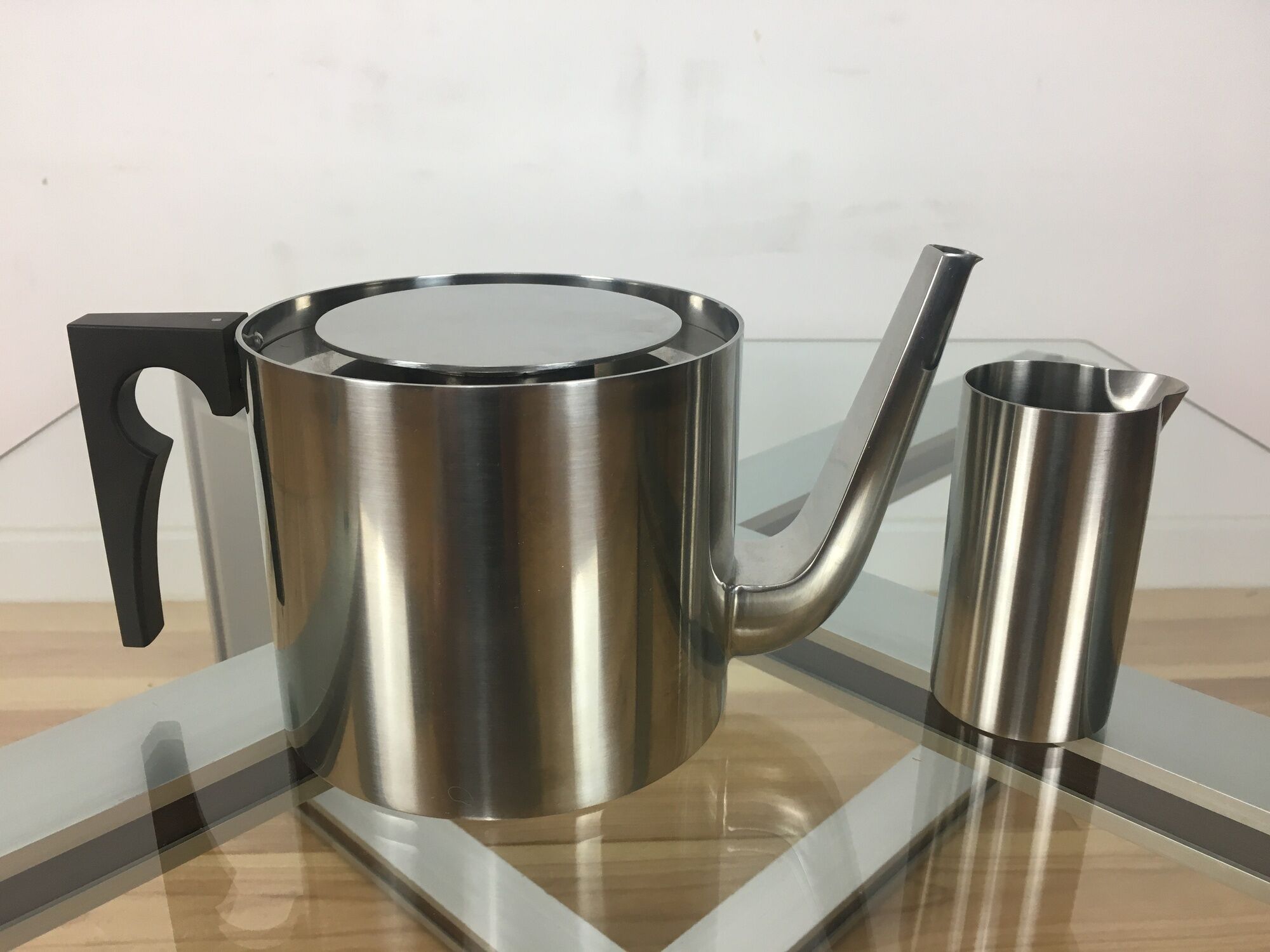 Arne Jacobsen stainless steel teapot and milk pot, Cylinda Line, by Stelton