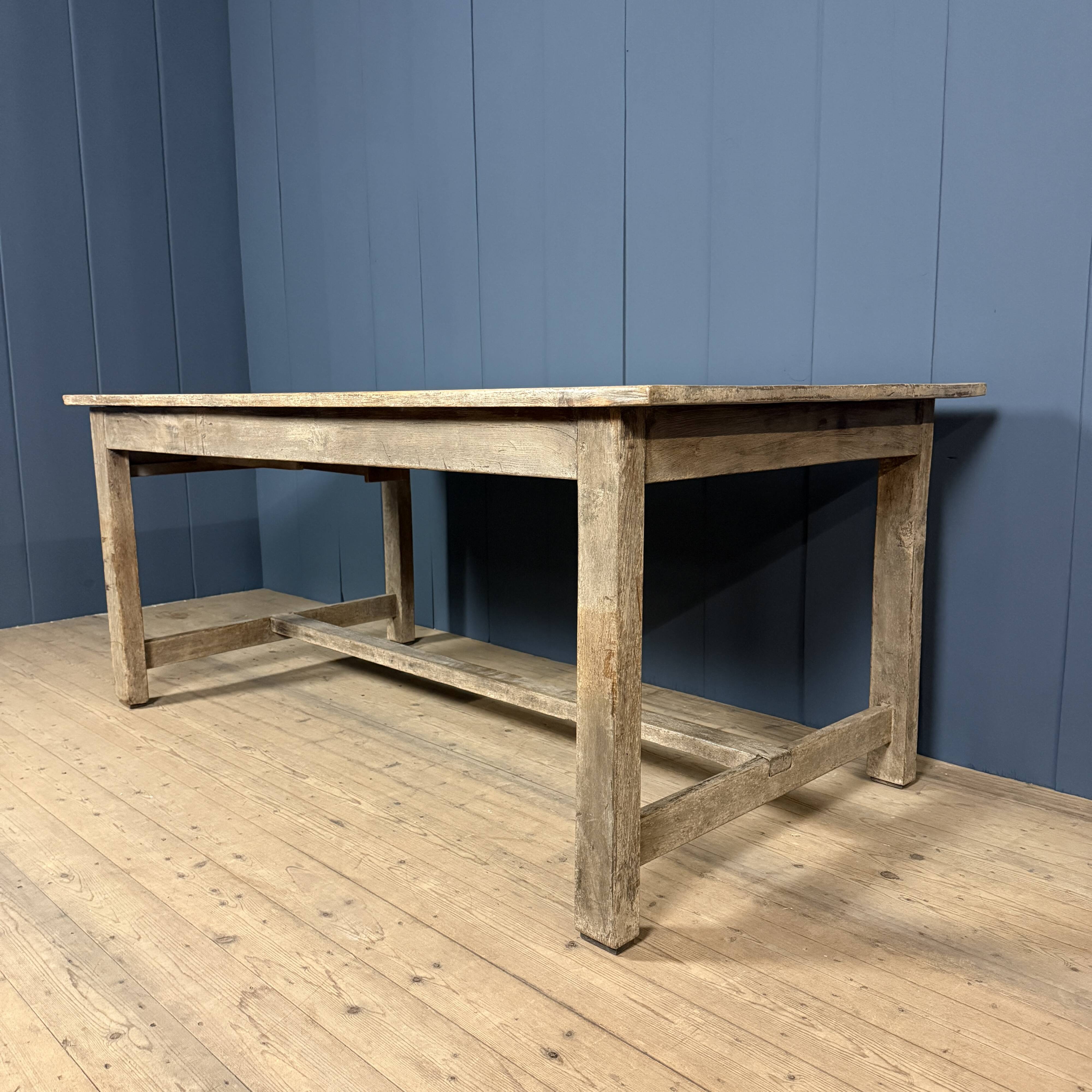 French farmhouse dining table with pine top and oak base