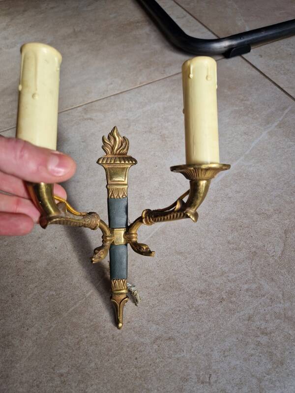 Pair of Empire-style wall sconces in gilded bronze and green lacquer.