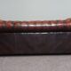 Chesterfield sofa in patinated orange leather, 2.5 seats