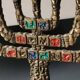 Menorah/Candlestick with 7 light arms. In old gold patinated brass/Decor 12 astrological signs. Engraved Jerusalem. Height 14 cm