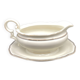 Porcelain sauce boat with black and gold checkered border